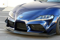 The APR carbon fiber aero kit for the MKV 2020+ Toyota Supra includes front lip, side skirts and rear bumper skirts (AB-330920) installed showing front lip