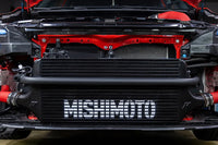 Mishimoto Performance FMIC & Intake Kit for 2022+ WRX (MMINT-WRX-22AIBKRD) black front mount intercooler with red piping installed on VB WRX