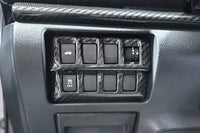Add style to the interior of your 2022+ WRX with this Rexpeed carbon fiber left switch button panel surround trim and carbon fiber blank button covers. Retains an open space for the display brightness dimmer scroll, tailgate/ trunk switch, and traction control switch. Includes 3M tape for easy installation (G98) installed