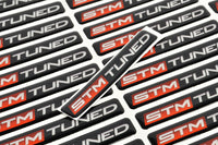 STM Tuned Badge