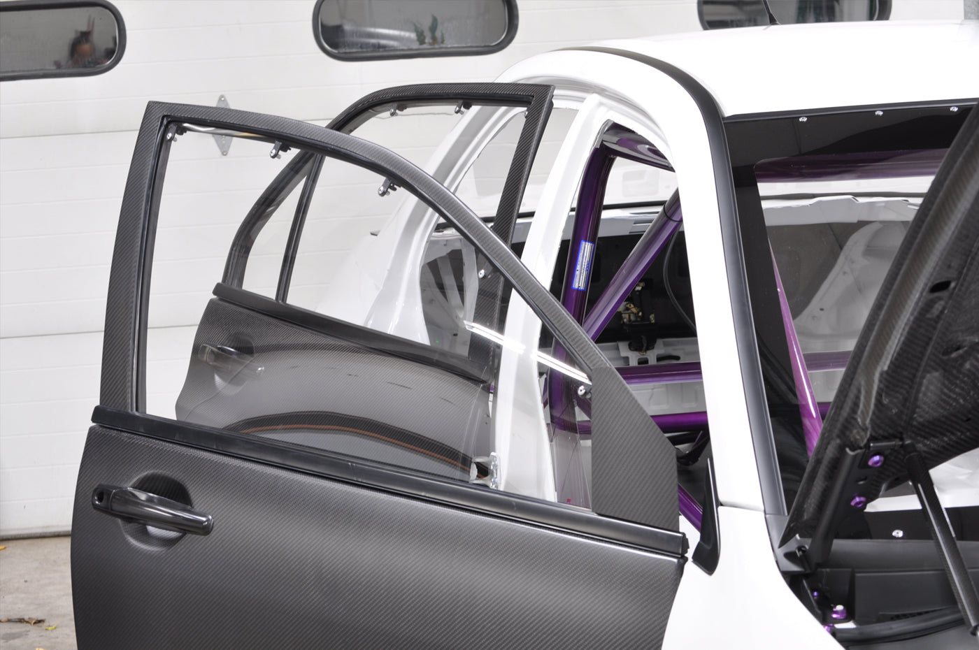 Seibon Carbon Fiber Rear Doors for Evo 7/8/9 (DD0305MITEVO8-R)