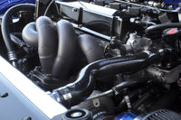 Evo 7 8 9 Stock Replacement Exhaust Manifold installed with black ceramic coating