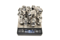 Titanium Lug Nuts M12 x 1.5 set of 20 on a scale